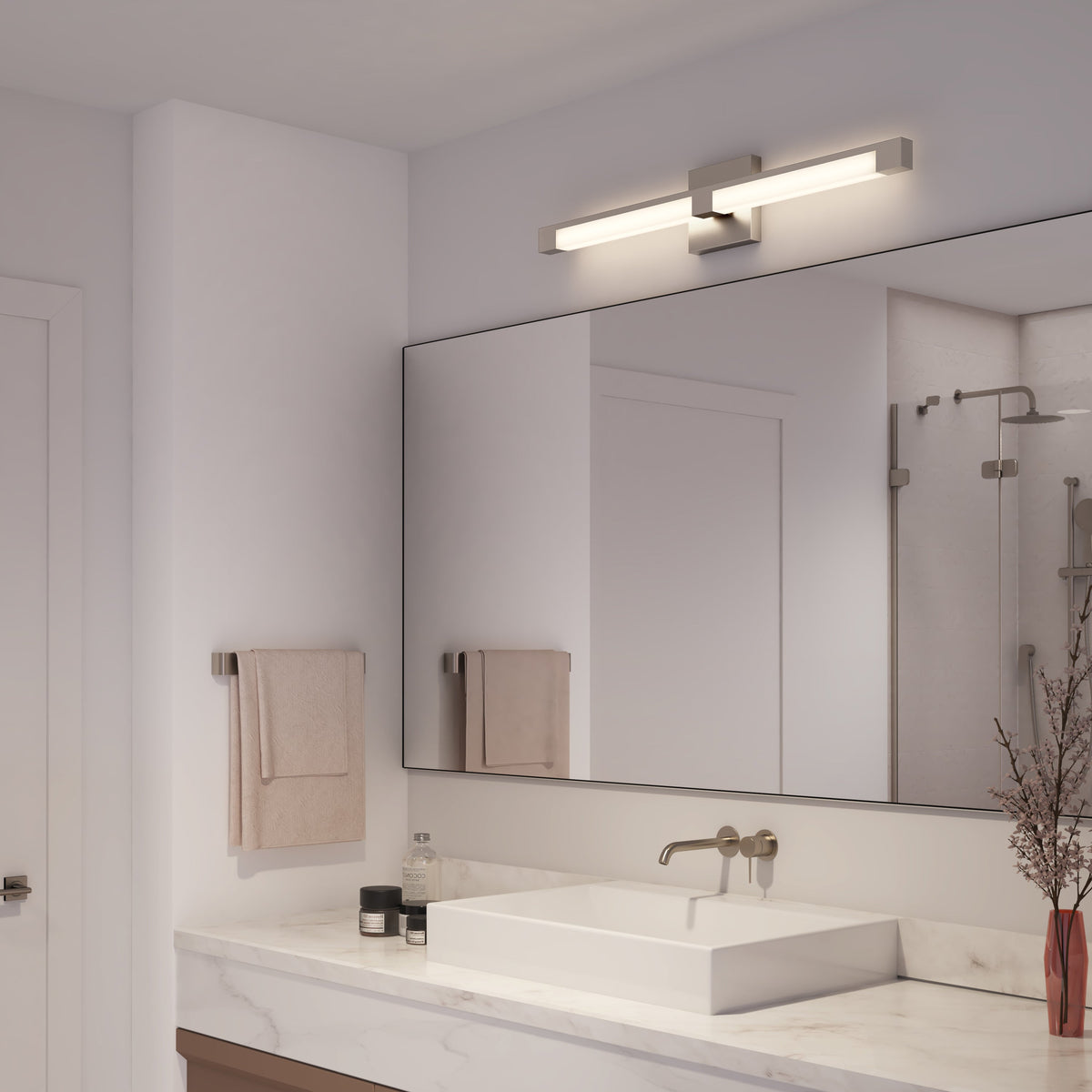 bathroom vanity light with mirror in a neutral setting