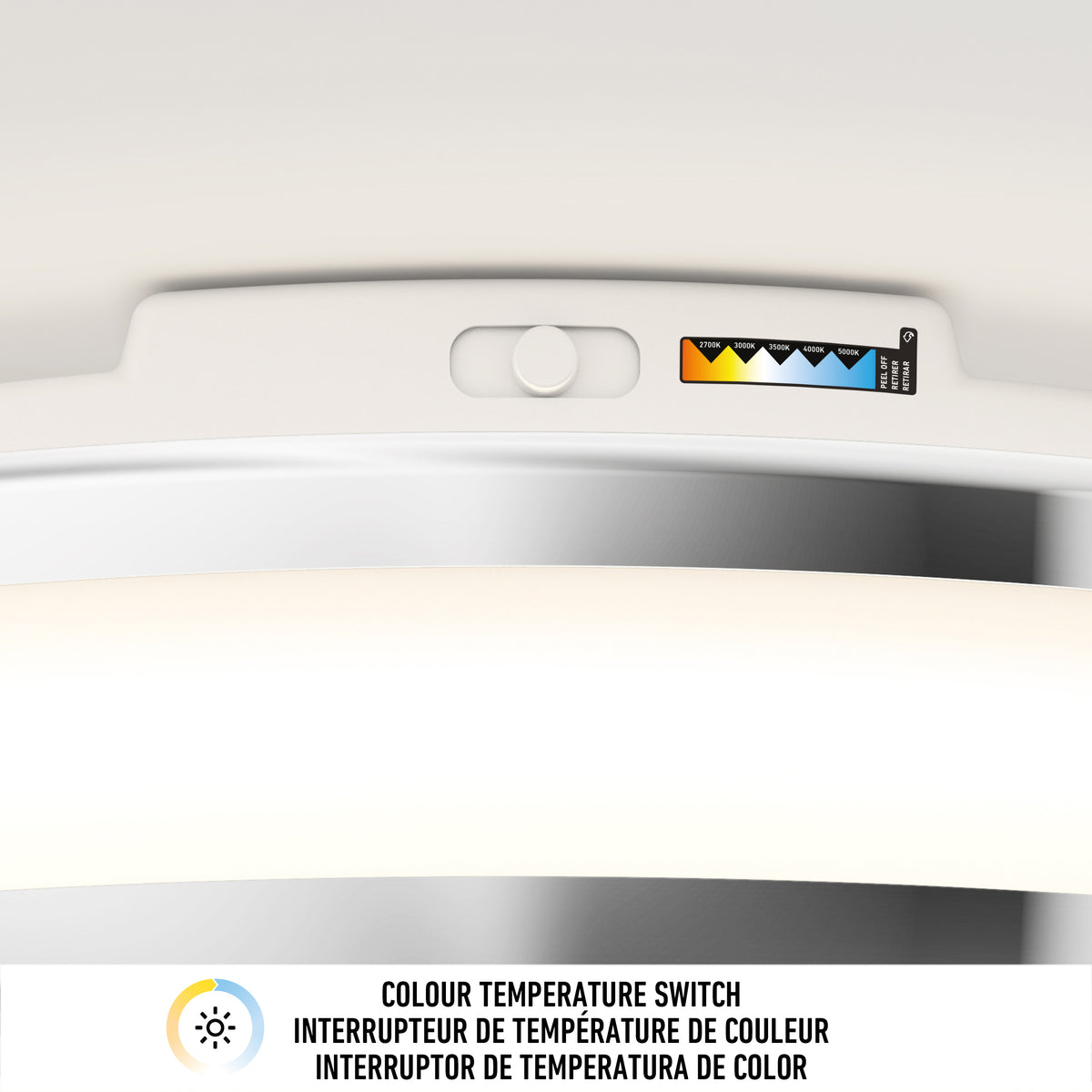 Close-up of the Artika Hemisphere 15 in. LED flush mount light 5 CCT with a color temperature switch and adjustable brightness. A label above shows a range from warm yellow to cool blue. Below: Colour Temperature Switch in three languages.