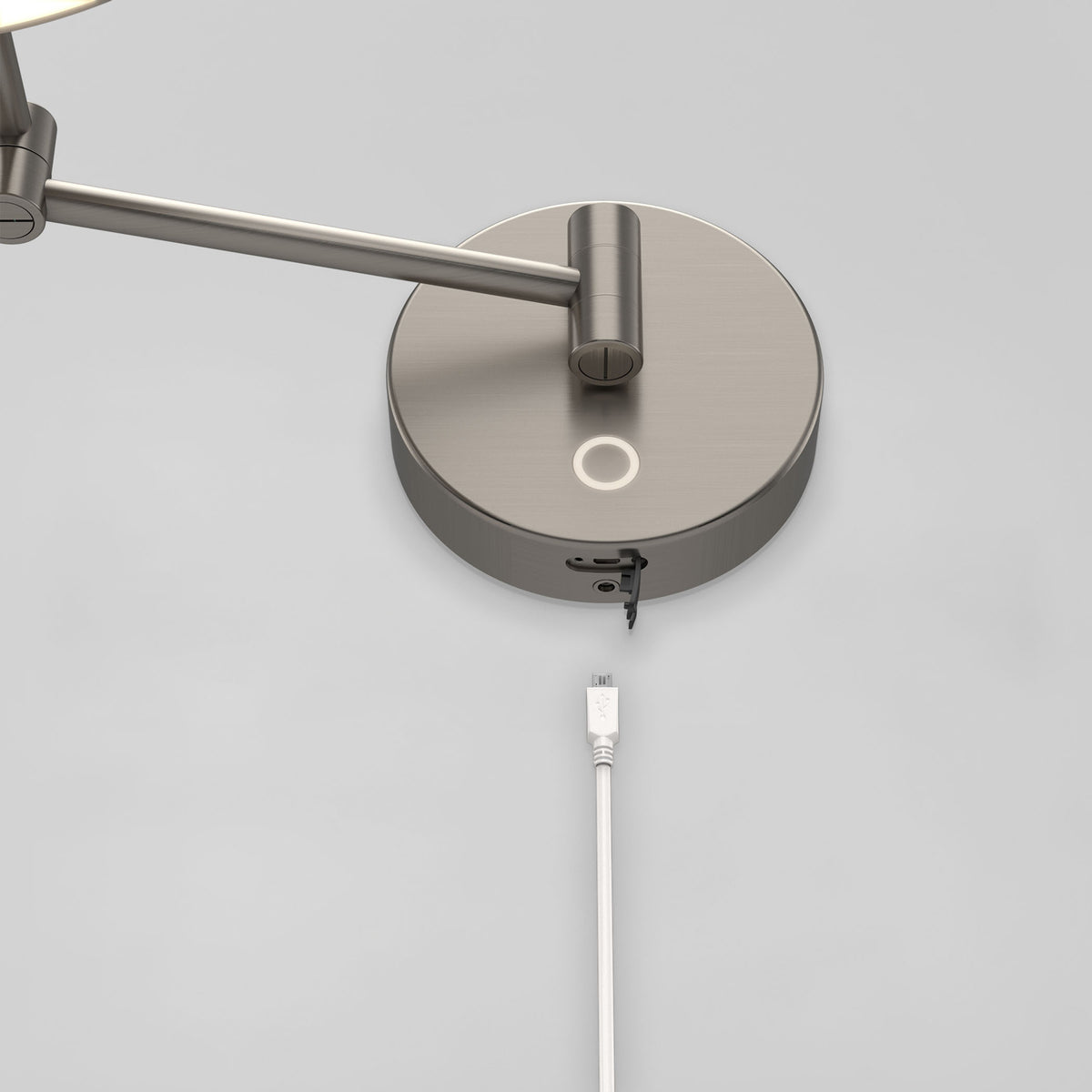 The Artika Radia 9 in. Cordless LED Cosmetic Mirror is wall-mounted with a silver finish and a white USB cable against a plain background.