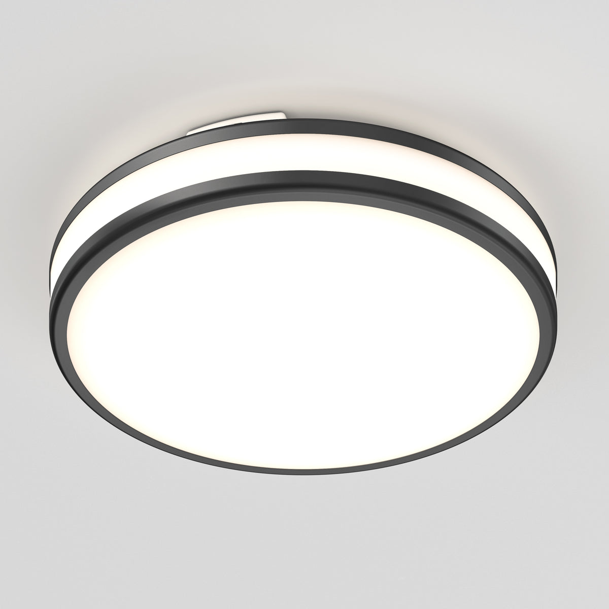 The Artika Hemisphere 15 in. LED flush mount light features a modern circular design with a black rim, a white illuminated center, and adjustable color temperature, mounted on a white ceiling.