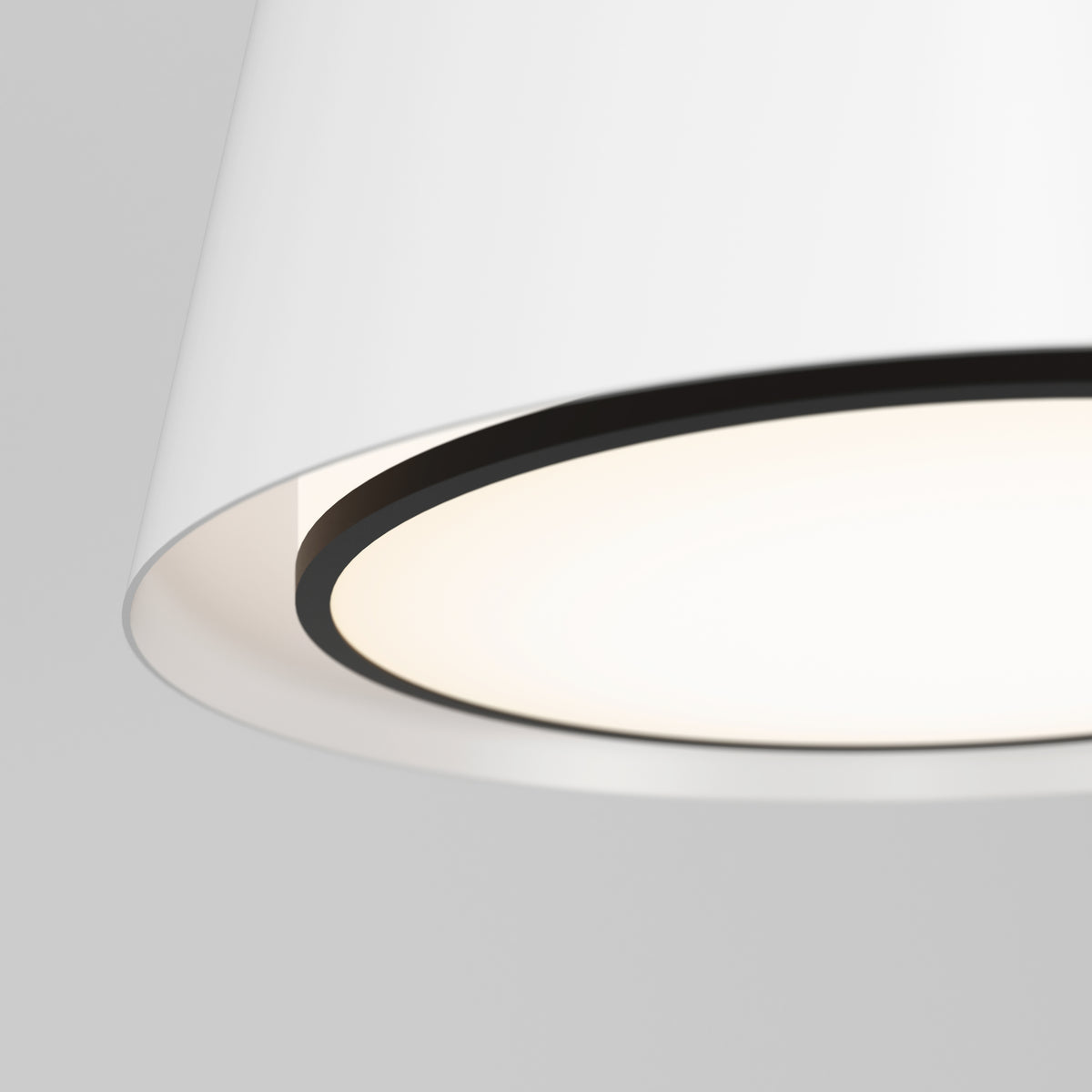 Close-up of the Artika Cappa LED pendant light 3 CCT, featuring a modern white, slightly conical shade and a warm white glow against a plain light gray background.