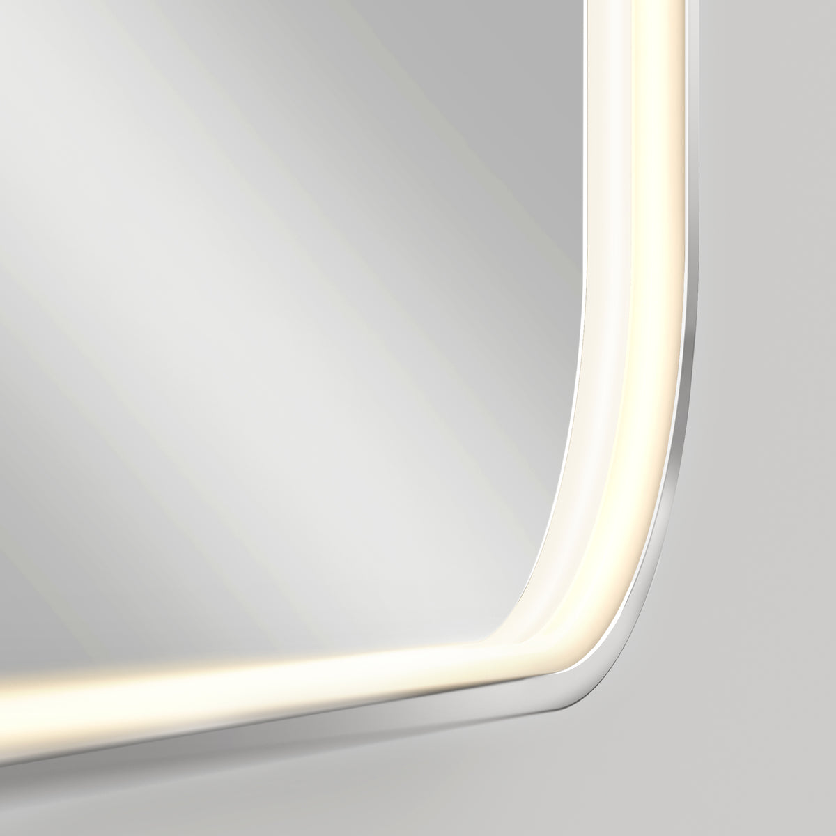 Close-up of the Artika Royce Dimmable LED Mirror, 3 CCT, featuring built-in edge lighting with adjustable color temperature and soft reflection. Can be mounted horizontally or vertically.