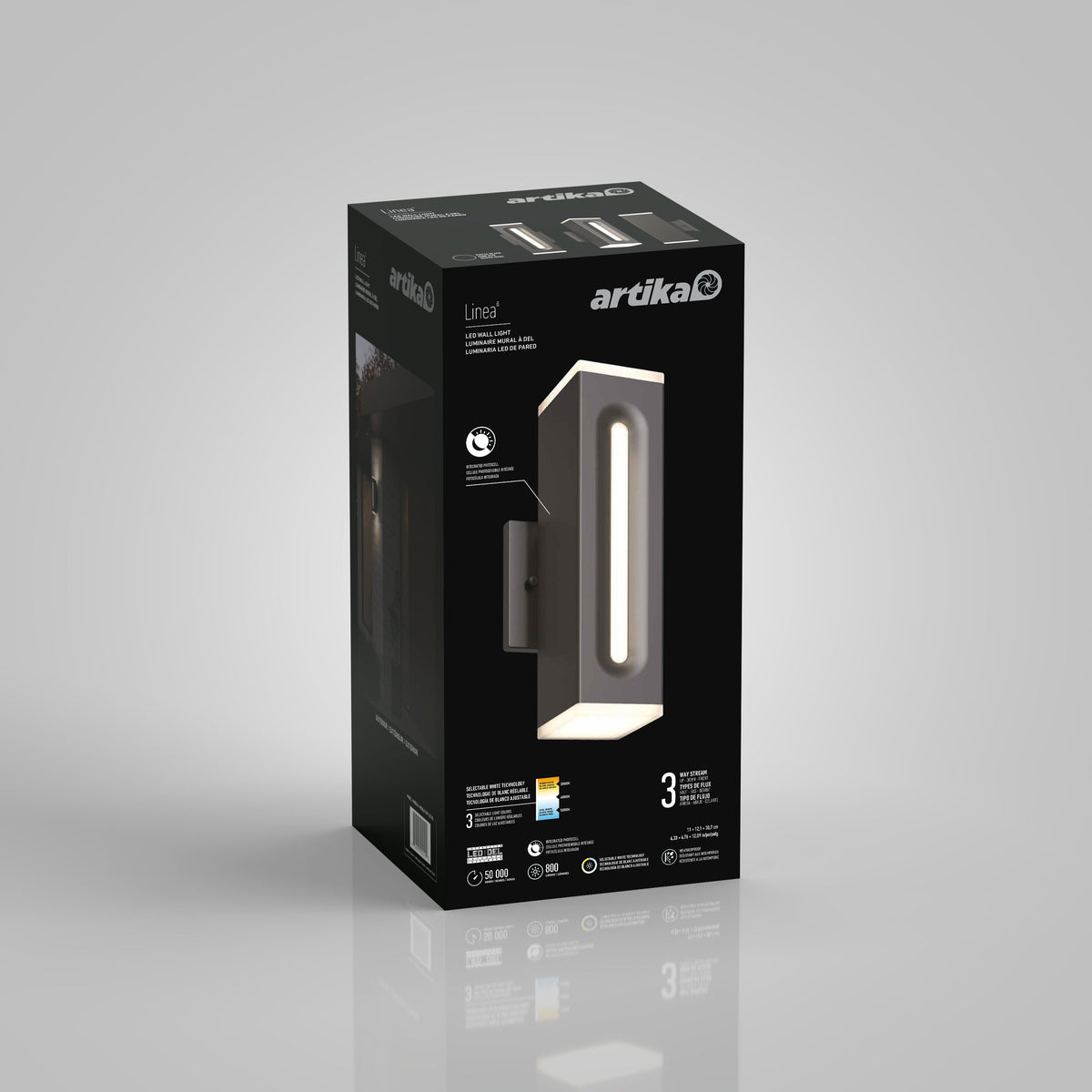 A black rectangular Artika box for the Linea Square LED indoor-outdoor wall light 3 CCT shows the modern vertical lamp image, product info, icons, and branding on a plain gray background.