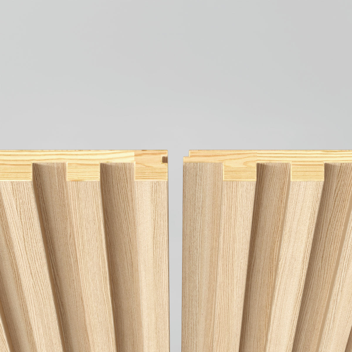 The Artika Panolok 30.67 ft wall panel kit (pack of 8) features two light wood panels with interlocking grooves and ridges, vertically aligned against a plain gray background, showcasing precise joinery and Scandinavian style.