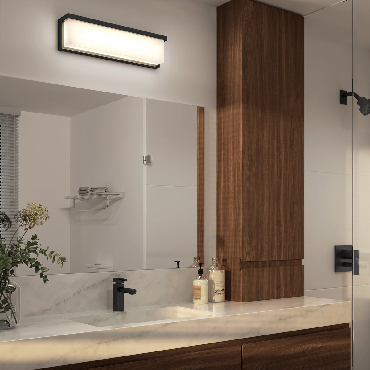 Modern bathroom with a marble countertop, wood cabinets, and the Artika Bristol modern LED bathroom vanity light 3 CCT above a large mirror.