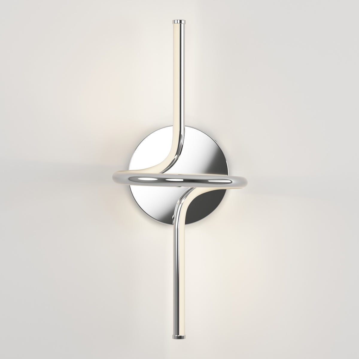 The Swirl LED Sconce by Artika features a polished chrome finish, circular base, and two curved vertical light bars intersected by a horizontal ring, casting a soft glow on any wall.