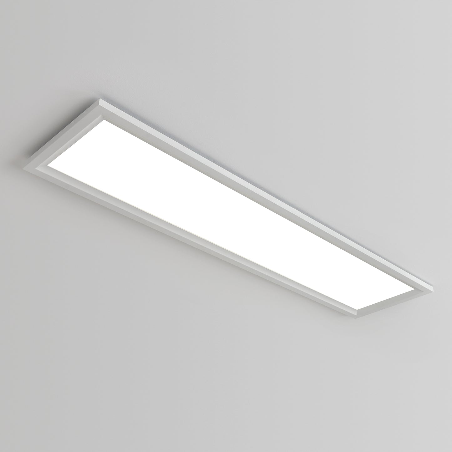 The Artika Sunray ultra thin LED light panel 3 CCT features a slim, modern white frame that mounts flush on a plain white ceiling, providing bright and even illumination.