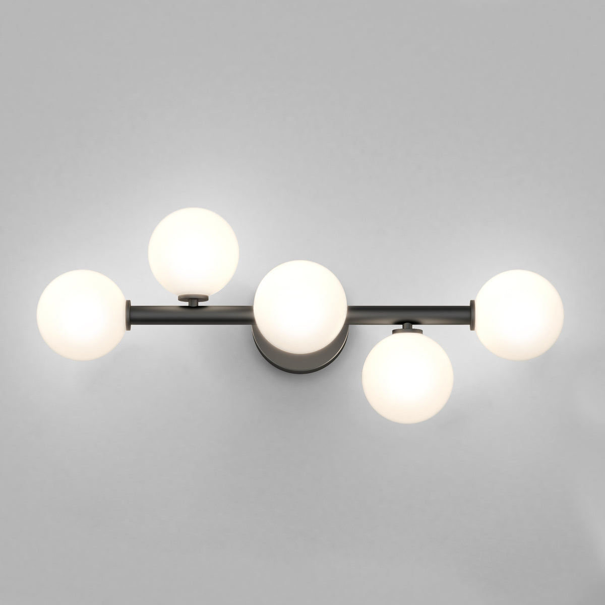 The Artika Bloom 27-in (69 cm) 3-Light Modern LED Vanity Light features sleek black metal arms and three frosted glass globes, perfect for stylish bathroom lighting against a light gray wall.