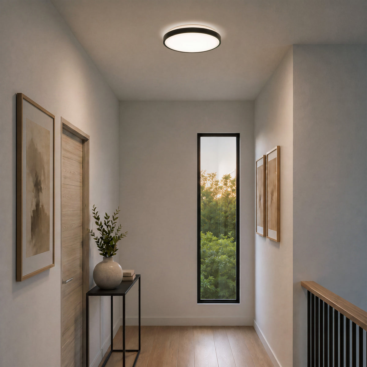 Bright hallway with wood flooring, framed art, a potted plant, and Artika’s Isara 12 in. RGBIC LED Flush Mount lighting.