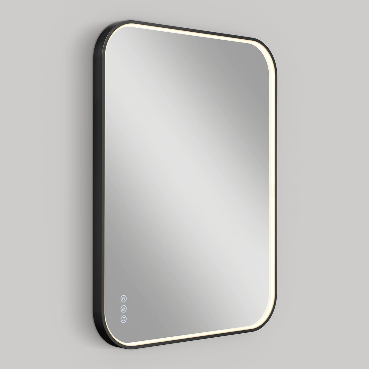 The Artika Royce Dimmable LED Mirror features a rectangular design with rounded corners, 3 CCT options, a glowing LED border, and three touch controls on the lower left, shown wall-mounted horizontally against a plain gray background.