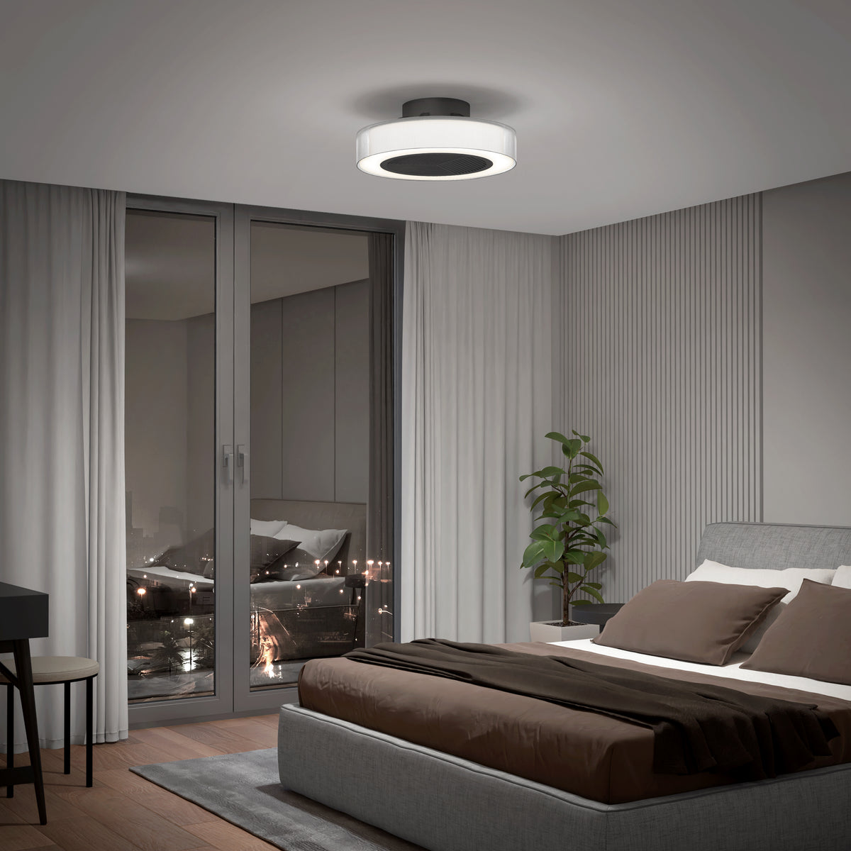 Modern bedroom featuring the Artika Groove 20 in. LED modern ceiling fan with remote, a neatly made bed with brown and white bedding, potted plant, floor-to-ceiling curtains, and large glass doors reflecting city lights at night.