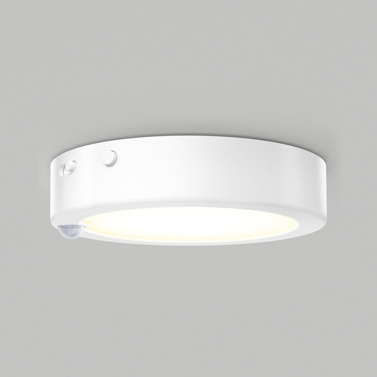 The Artika Accent under cabinet LED light 3CCT features a smooth, white finish, a side button, and a discreet motion sensor, casting a gentle glow against a light gray background.
