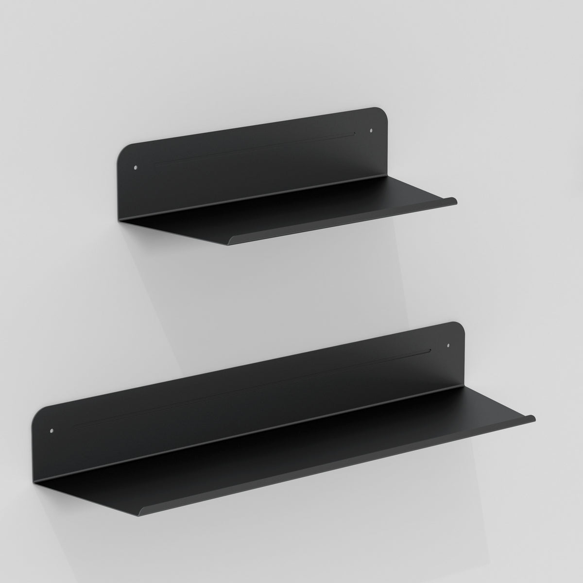 The Artika Sonokit set includes sleek black shelves and hooks for Sonolok and Sonofold wall panels. Their minimalist design ensures quick installation and adds stylish, functional storage to any modern space.