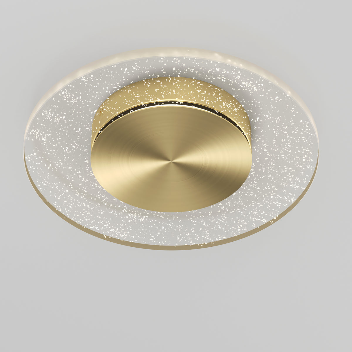 The Artika Essence Disk LED flush mount is a modern ceiling light featuring a circular gold center and a translucent outer ring with tiny glowing lights, installed on a plain white ceiling.
