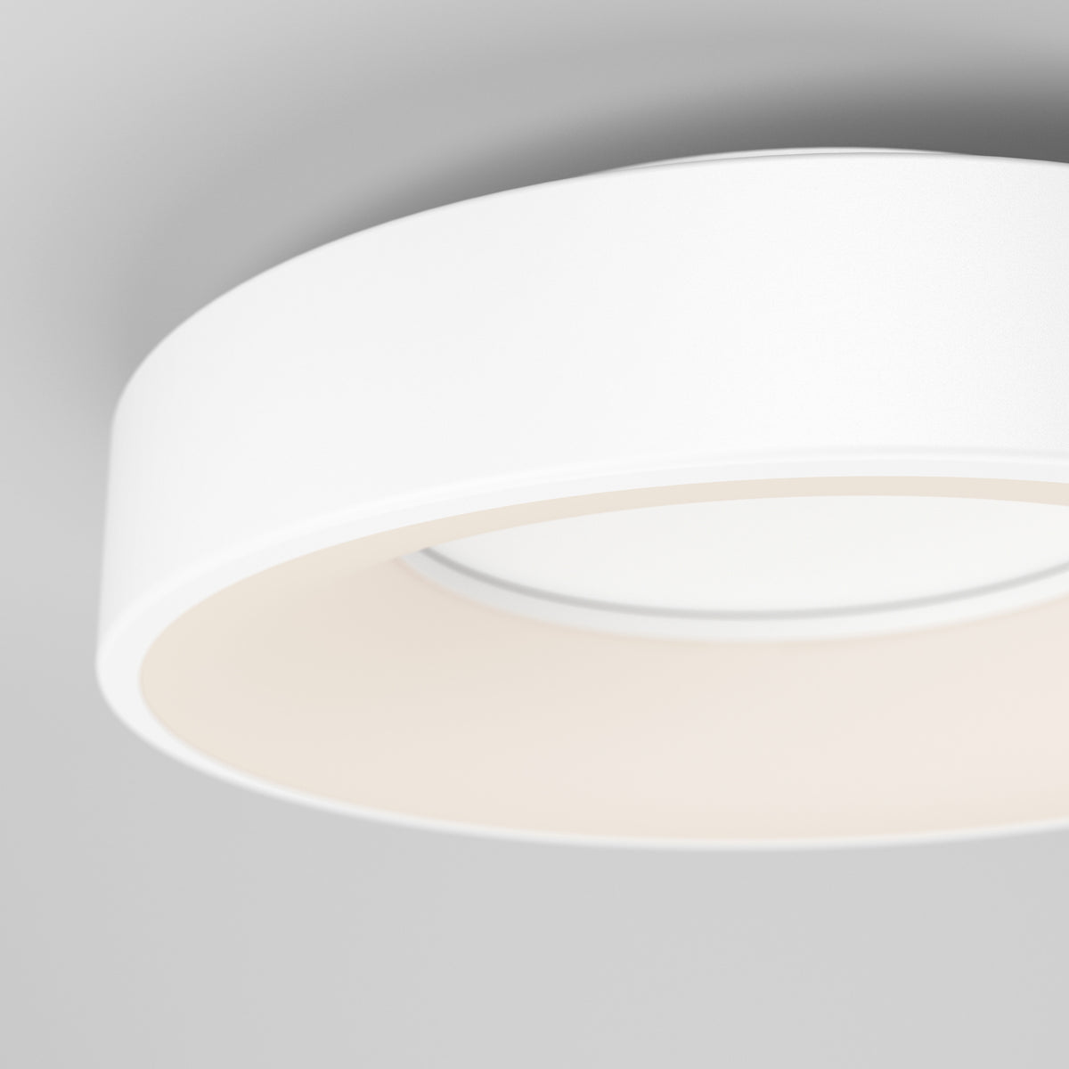 A close-up of the Artika Aiden LED flush mount ceiling light, featuring a modern circular white design, set against a plain light gray background.
