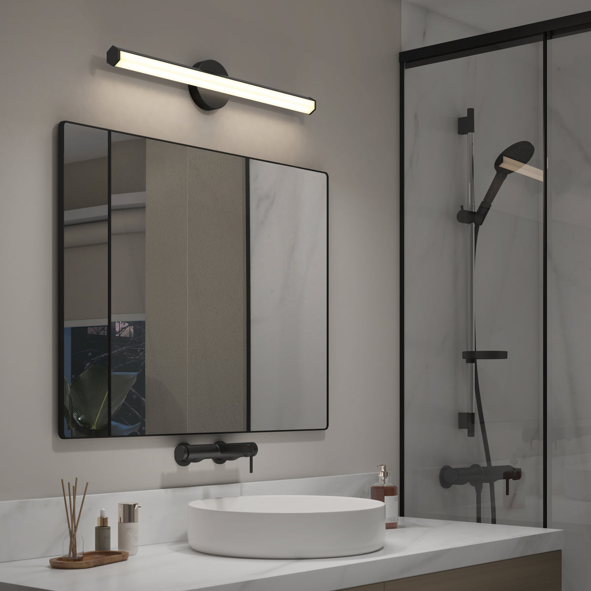 Modern bathroom with large mirror, vessel sink, Artika Ewen LED vanity light, and a glass shower with black showerhead.