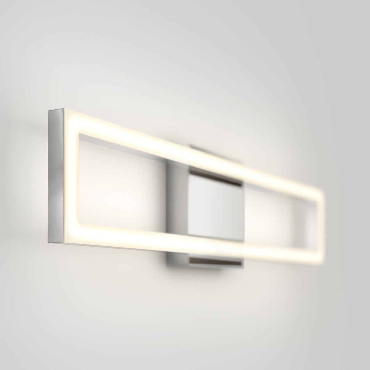 The Artika Dover modern LED bathroom vanity light 5 CCT features a sleek, minimalist design with a metallic base and glowing LED frame, mounted on a white wall for soft, even illumination.