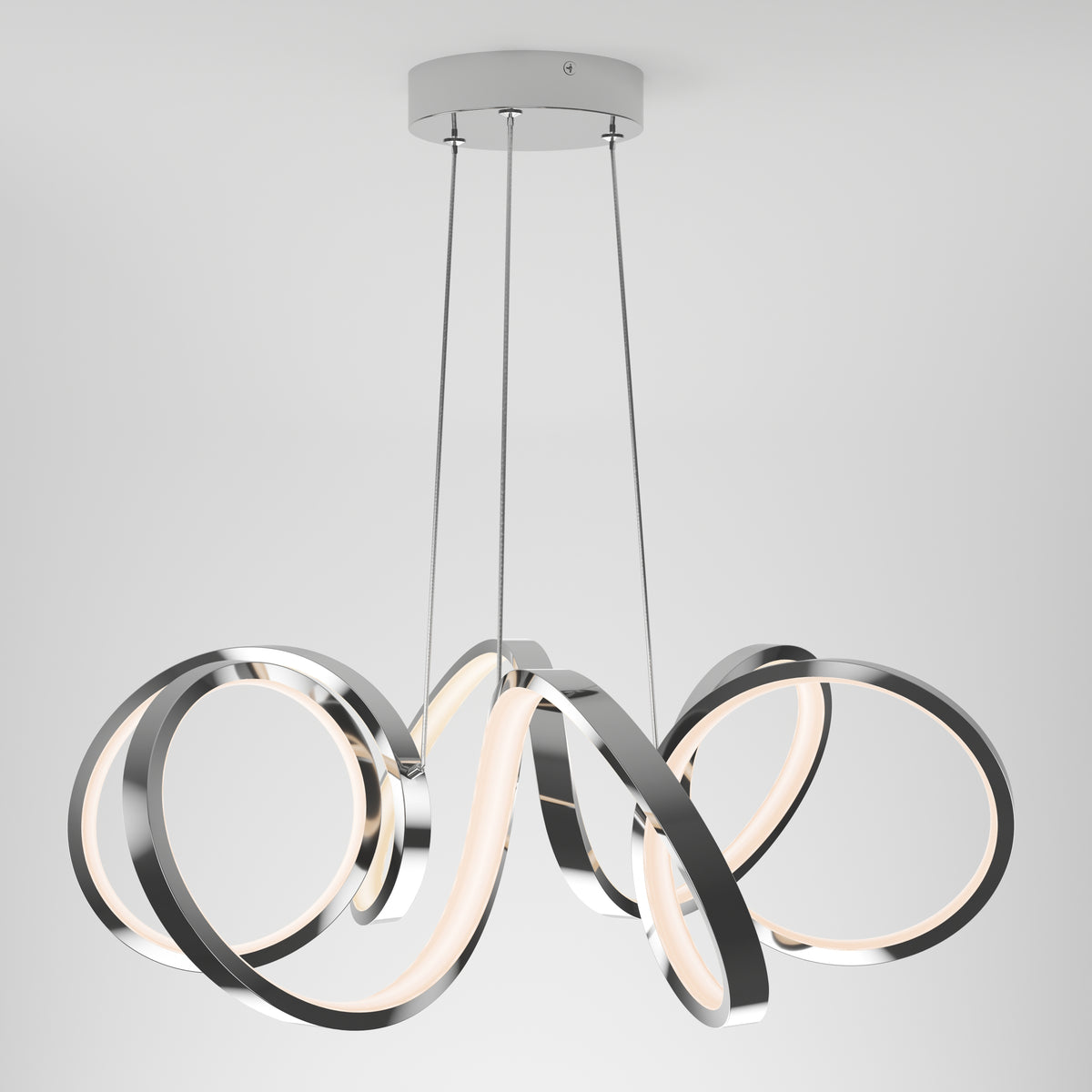 The Artika Swirl Ribbon LED pendant light features intertwined chrome and white bands with integrated LEDs, suspended by three cords for a modern sculptural look.