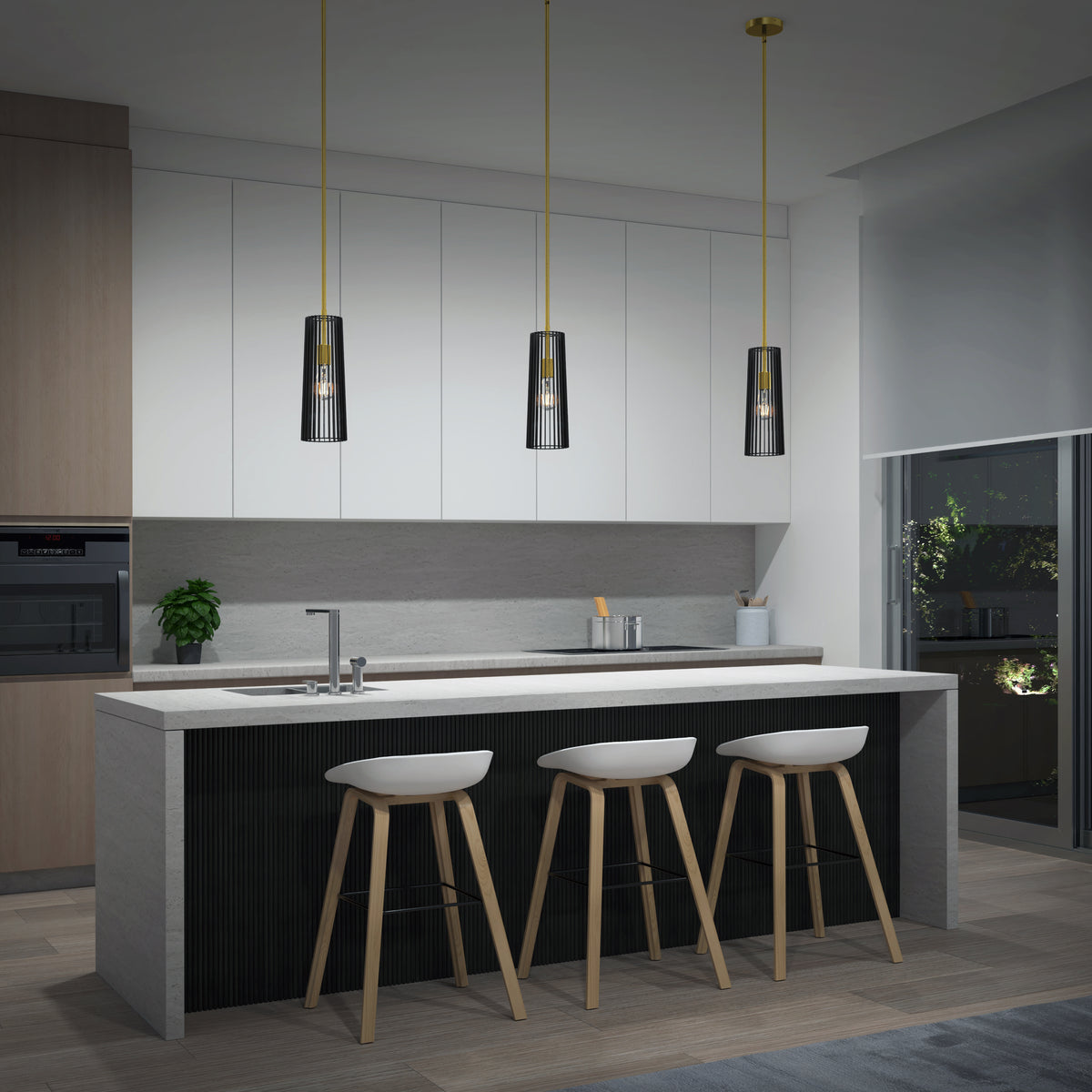 Modern kitchen with a large island, three white bar stools, minimalist cabinetry, built-in oven, a potted plant on the counter, and an Artika Gatsby Mini modern mid-century pendant light above. A window displays greenery outside at night.