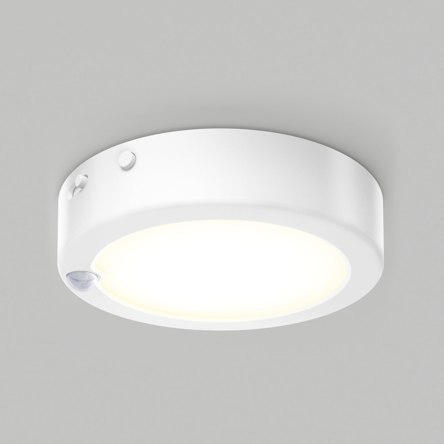 Artika Accent under cabinet LED light 3CCT with a glowing center and small sensor on the edge, mounted on a plain gray ceiling.