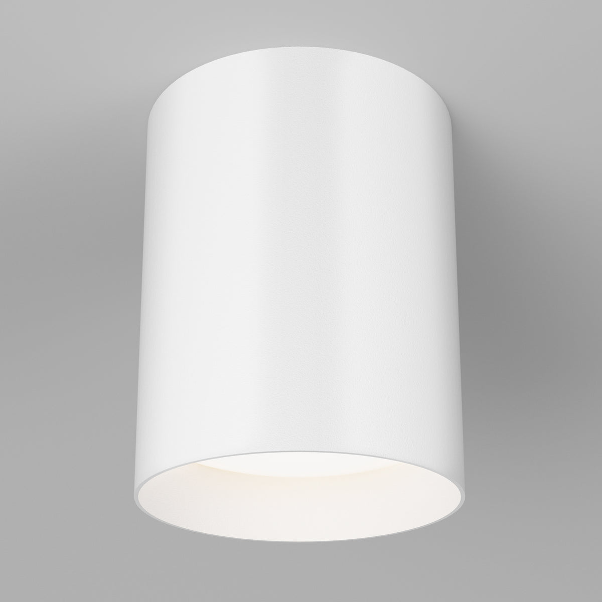 The Artika Radius LED flush mount light 3 CCT features a modern cylindrical design and mounts on gray ceilings. Its adjustable color temperature lets you customize ambiance for any space.