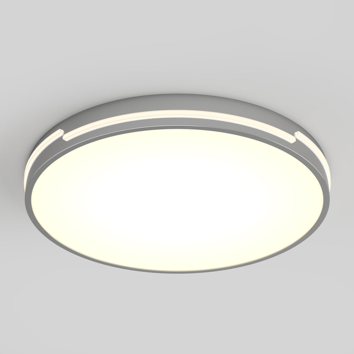 The Artika Delray 15.7 in. LED modern flush mount light features a white illuminated center, a silver-gray rim, and 5 selectable color temperatures, mounted on a plain light-gray ceiling.