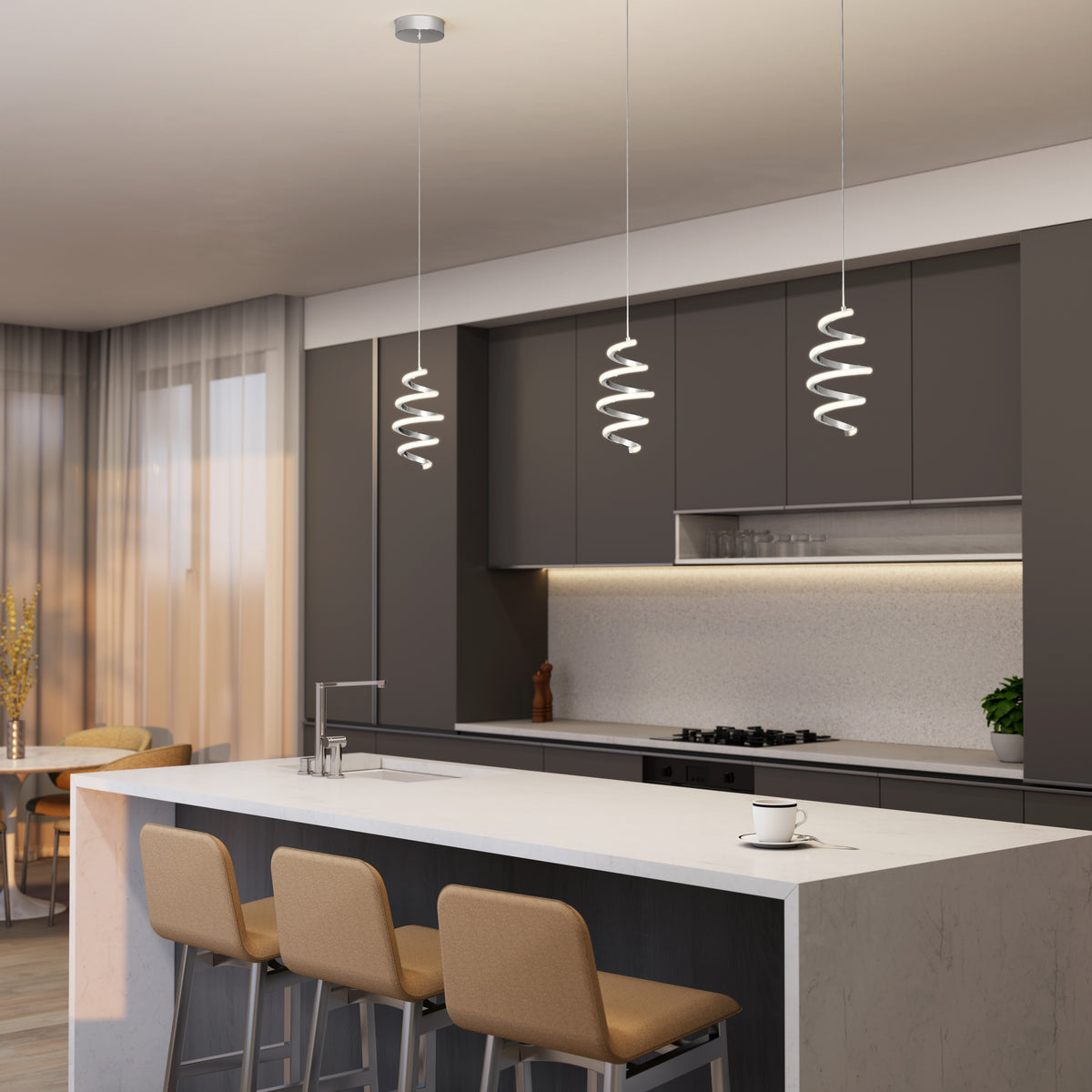 Modern kitchen with dark cabinets, white island, three beige barstools, and three Artika Chorus 1-light LED pendant lights overhead. A cup rests on the island as natural light streams through large windows with sheer curtains.