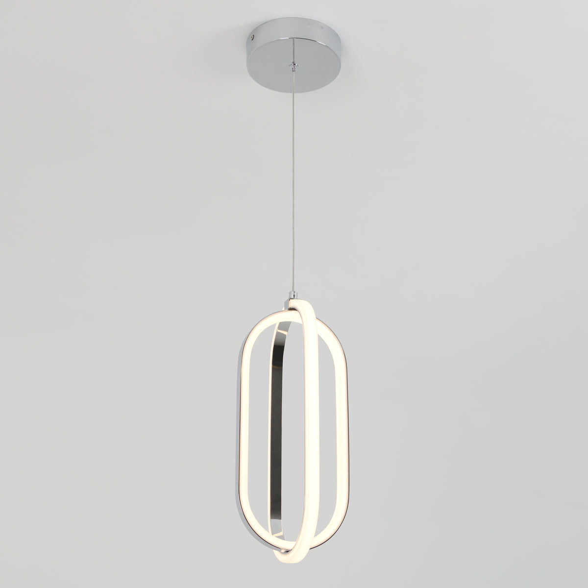 The Arlo 1-light LED pendant by Artika features two intertwined oval LED rings suspended from thin wires and a round chrome ceiling mount, shown against a plain white background.