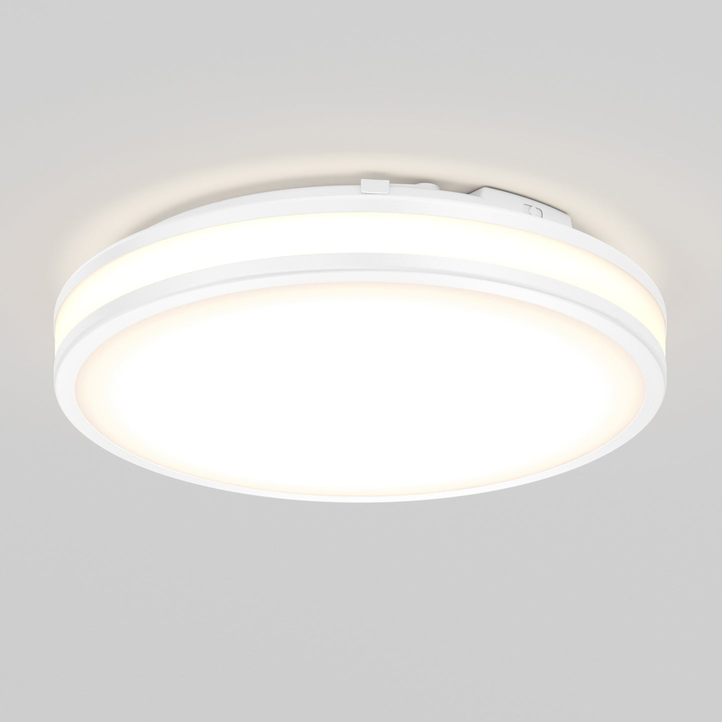 The Artika Hemisphere 15 in. LED flush mount light features a modern round design with a frosted cover, mounted on a light gray ceiling. Its 5 CCT adjustable brightness makes it perfect for bathroom lighting and any mood.