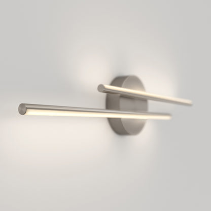 The Artika Cisco modern LED bathroom vanity light 5 CCT features two parallel horizontal bars on a round metallic base, ideal for bathrooms and illuminating soft white light on light-colored walls.