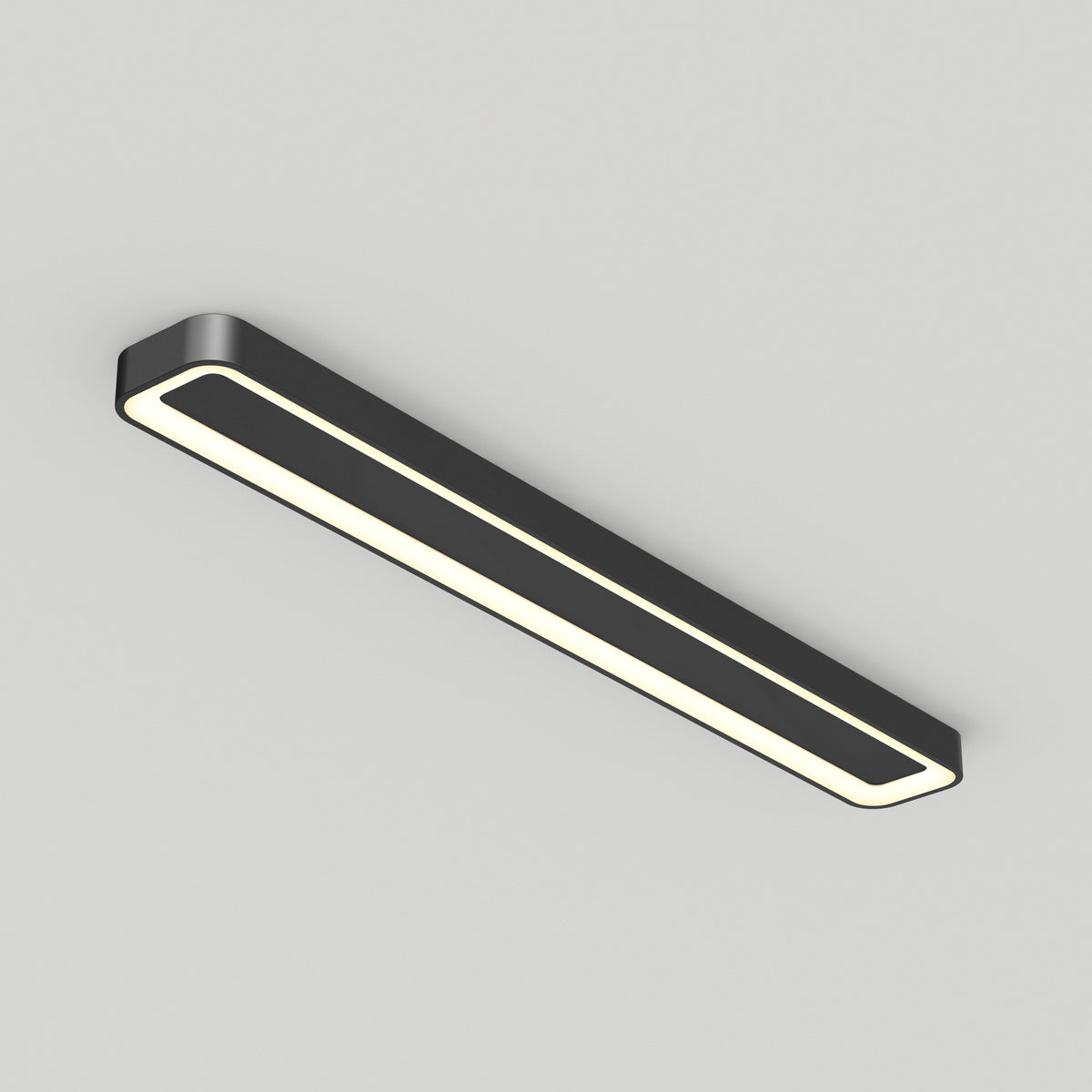 A modern rectangular ceiling light fixture with a black frame and a glowing white center, mounted on a plain light gray ceiling.