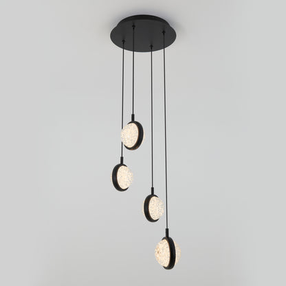 A modern ceiling light fixture with four hanging pendant lights, each featuring a circular design with textured, illuminated glass, suspended at different heights by black cords from a round black base.