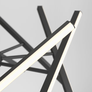 Close-up of the Artika Malibu LED pendant light 3 CCT, featuring intersecting black metal rods and glowing white LED tubes in an abstract, minimalist design, set against a plain light gray background.