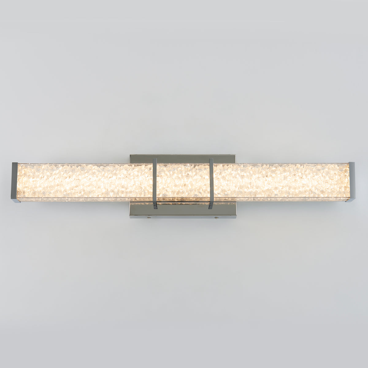 Artika Royale 27-in LED Vanity Light Bar: illuminated glass bar, metallic caps, premium crystals, on a plain gray background.