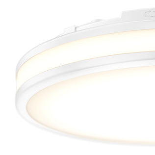 Close-up of Artika Hemisphere 15 in. LED ceiling light, flush mount, with 5 CCT adjustable brightness, glowing warmly.