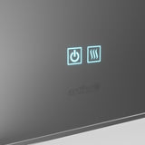 A close-up of a smooth, reflective surface with two illuminated touch icons: a power button on the left and a steam or heat icon on the right. The word artika is faintly visible below the icons.