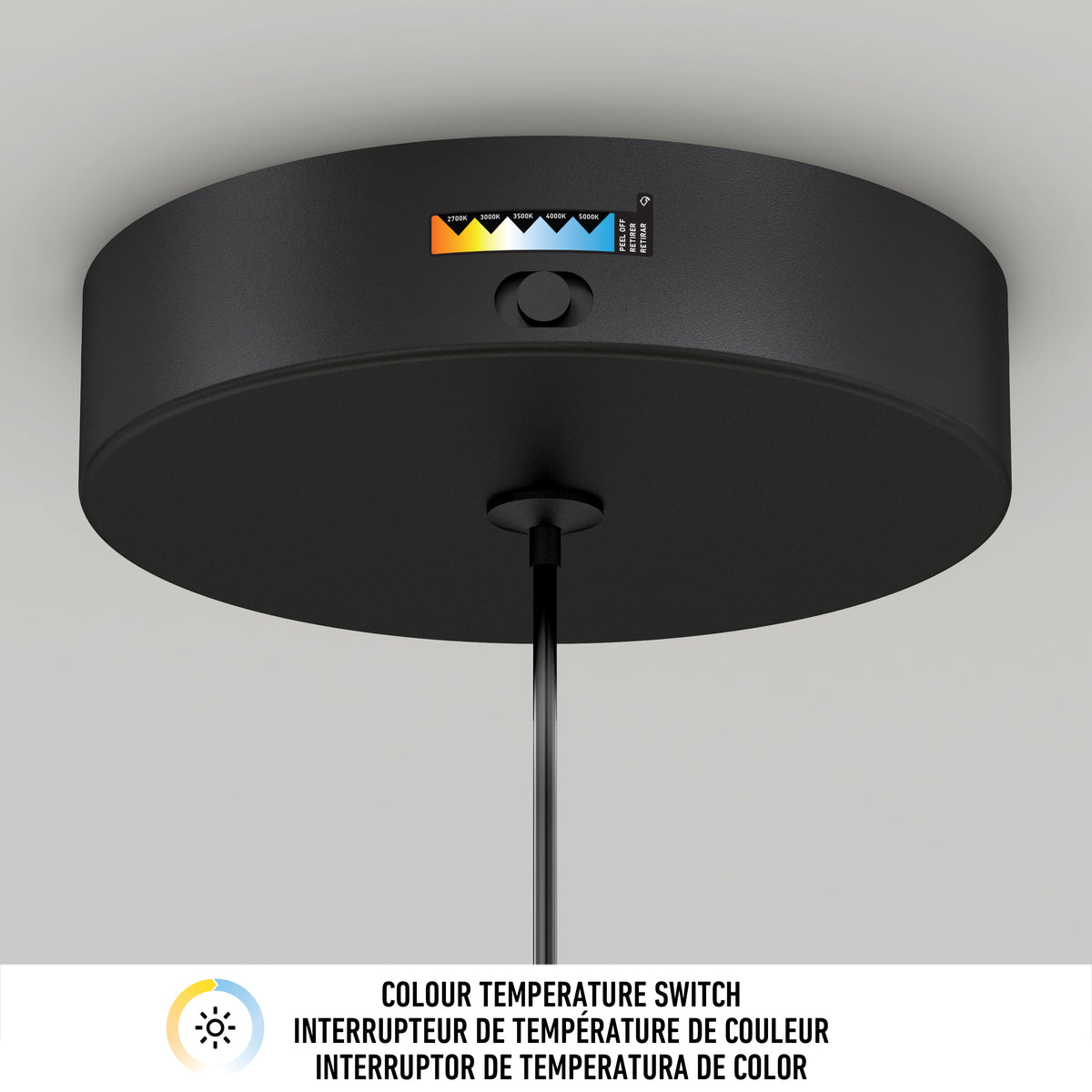 The image shows the Artika Hanson 1-light LED pendant, a black ceiling-mounted fixture with a color temperature switch and indicator. Below is a label displaying Colour Temperature Switch in English, French, and Spanish with a sun icon.
