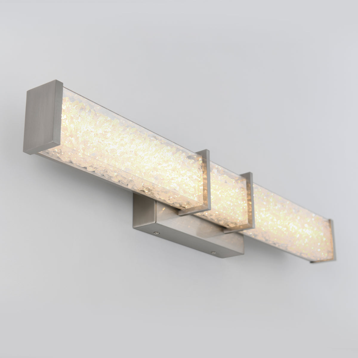 Artika Royale 27-in LED Vanity Light Bar features frosted crystal bars and brushed metal accents for a modern bathroom glow.