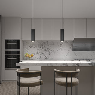Modern kitchen with marble backsplash and island, two cushioned chairs, built-in ovens, a bowl of fruit, a sleek range hood, all in neutral tones, and the Artika Groove LED modern pendant light (3 CCT) adding contemporary style.