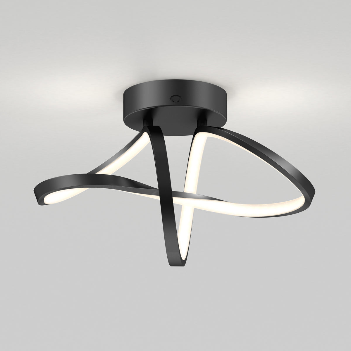 A modern ceiling light fixture with a black circular base and intertwined, curved LED light strips, creating an abstract, sculptural design against a plain white ceiling.