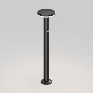 Artika Urbia Solar LED Bollard: Tall, black, cylindrical light with motion sensor and round top on a plain background.