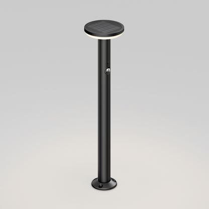 Artika Urbia Solar LED Bollard: Tall, black, cylindrical light with motion sensor and round top on a plain background.