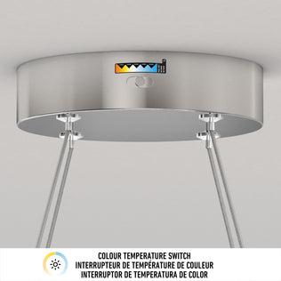 A close-up of the Artika Vanora LED pendant light 5 CCT shows its color temperature switch, indicator displaying various CCT options, and three cables extending from the bottom of the fixture.