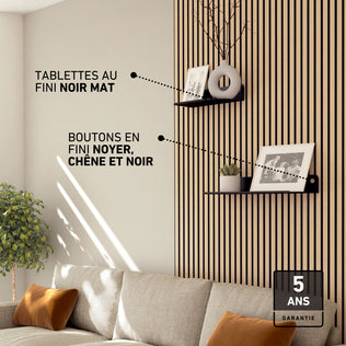 Living room with beige sofa, Artika Sonokit shelves & hooks for Sonolok/Sonofold panels, and 5-year warranty label.