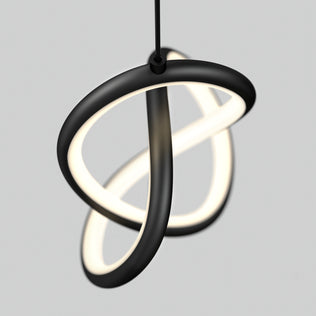 The Artika Zephyr LED pendant is a modern black sculptural light featuring intertwined glowing loops, suspended from the ceiling against a plain light gray background.