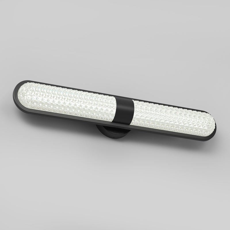 The Artika Carat LED vanity light features 3 CCT, a black frame, and textured white diffuser, shown on a plain gray background.