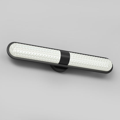 A modern wall-mounted LED light fixture with a black central mount and a textured, translucent cylindrical diffuser, set against a plain gray background.