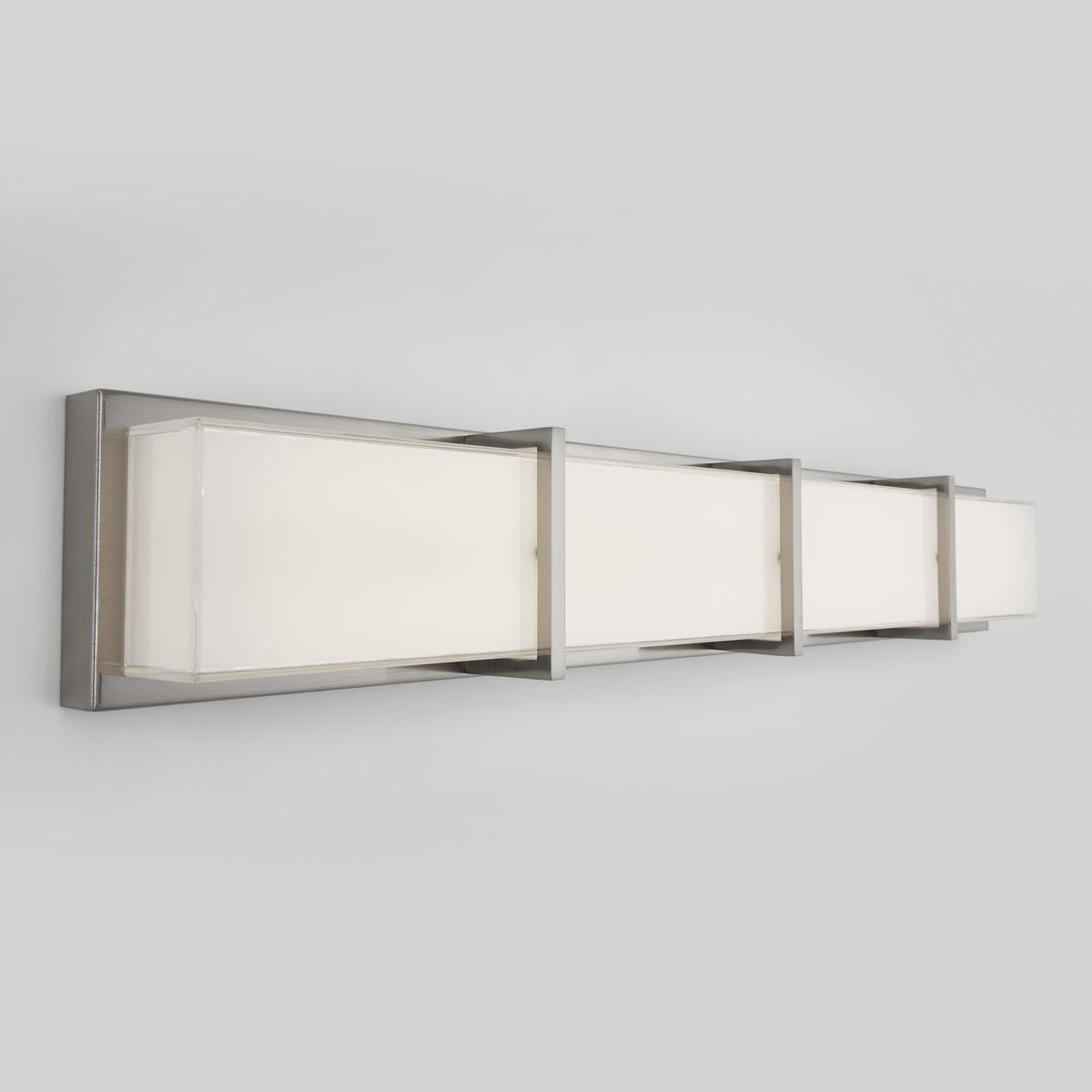 The Artika Subway 35-in (89 cm) Integrated LED Vanity Light Bar features a sleek brushed nickel frame and three rectangular frosted glass panels—ideal as a modern wall-mounted bathroom fixture.