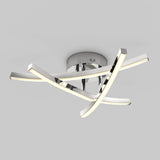 A modern ceiling light fixture with four curved, chrome-finished LED bars intersecting in an abstract design, mounted on a round chrome base against a plain gray background.