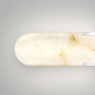The Artika Selena LED bathroom vanity light 3 CCT features a rounded white design with brownish veins, ideal for bathroom lighting.